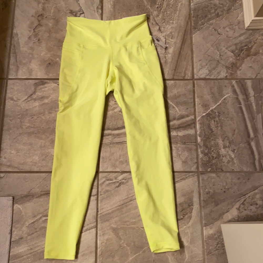Old navy BNWT size  small neon yellow 7/8 leggings